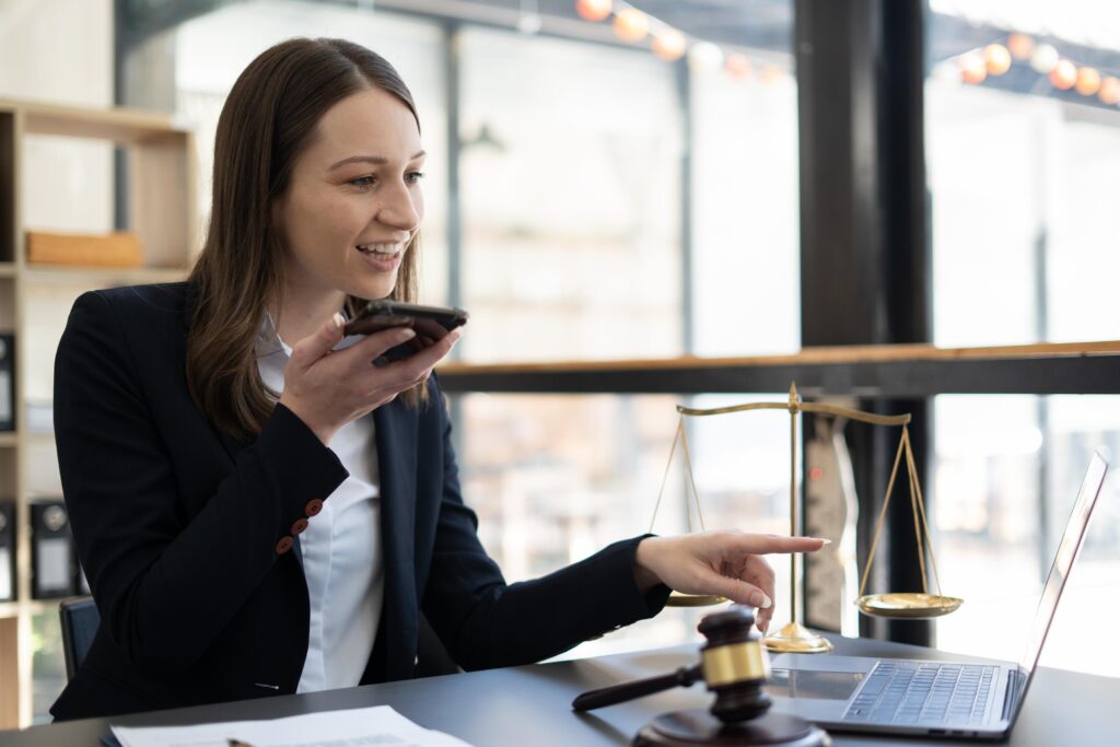 Woman lawyer working on a laptop. Legal law, advice and justice